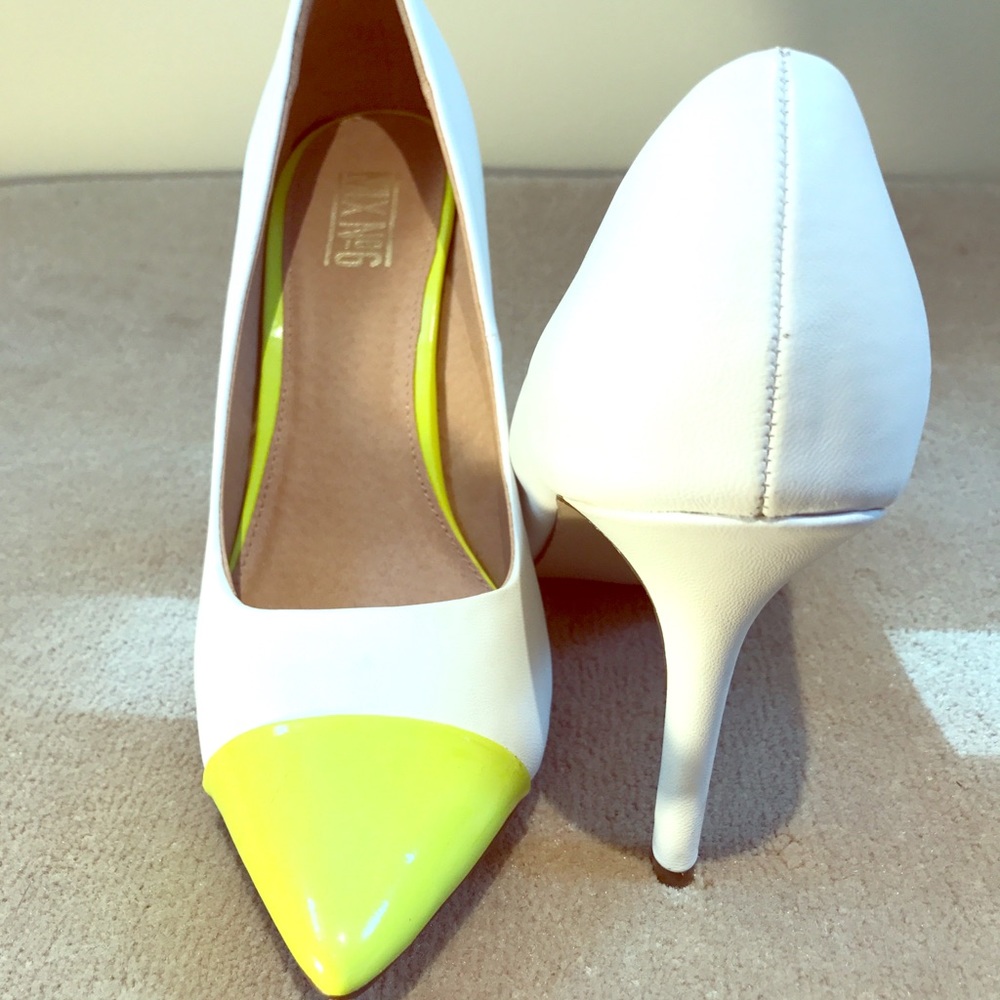 White and neon yellow pumps